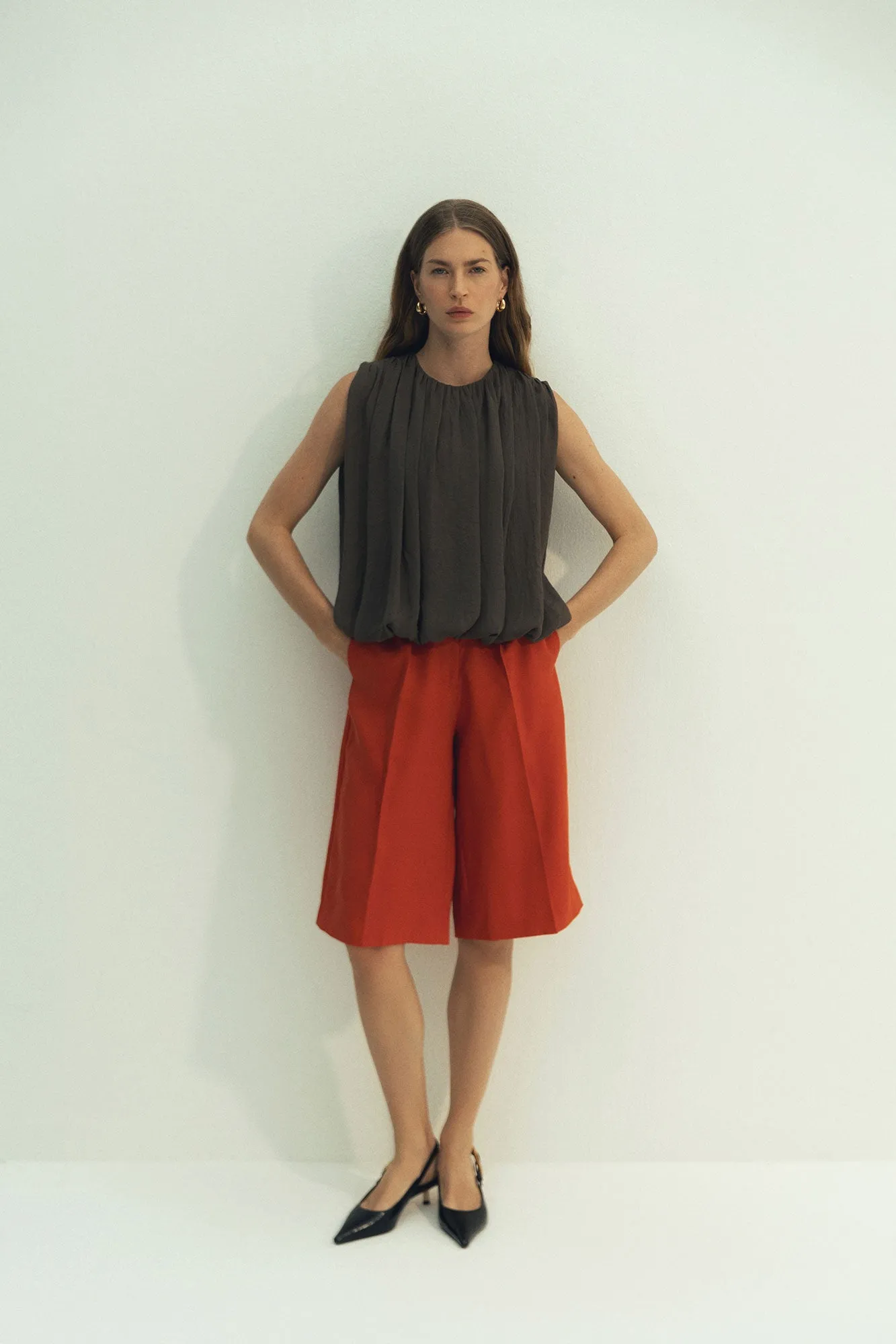 Mid Rise Bermuda Shorts in Red