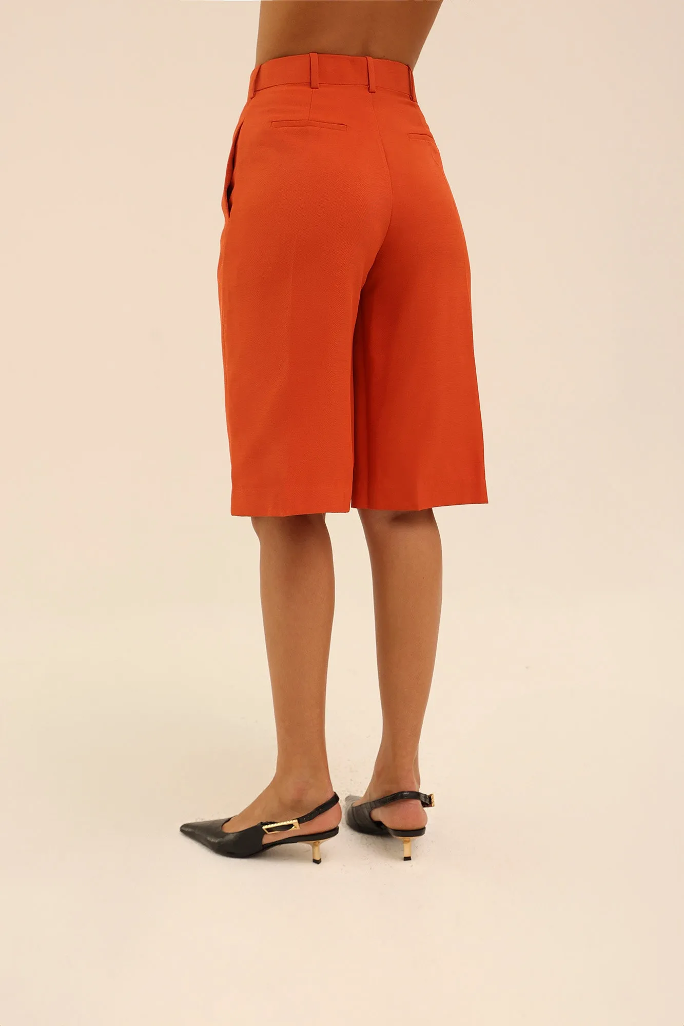 Mid Rise Bermuda Shorts in Red