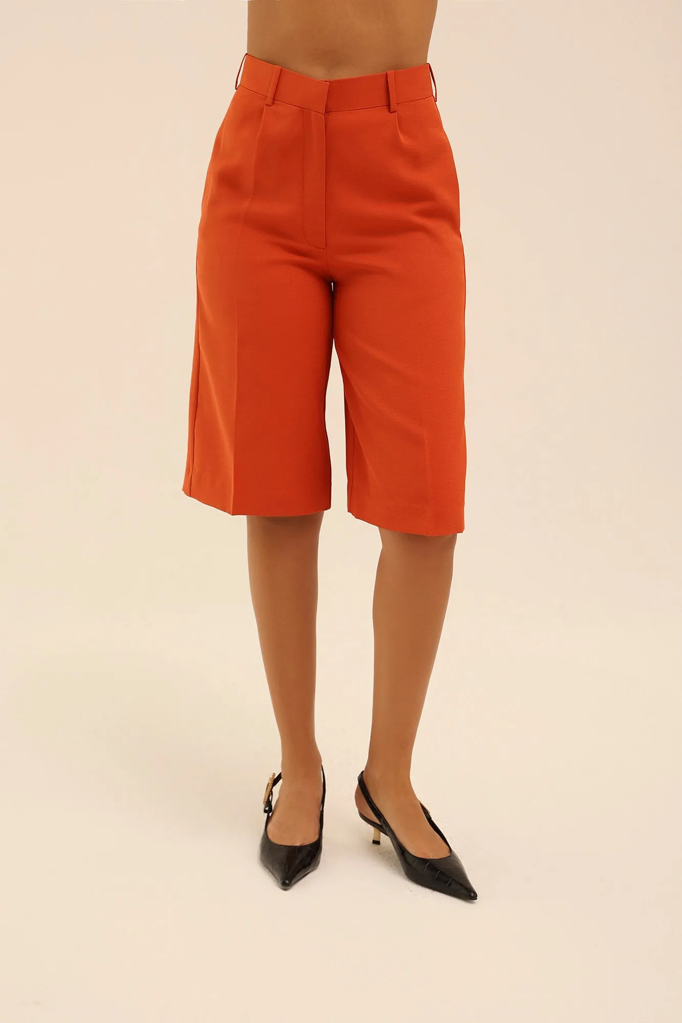 Mid Rise Bermuda Shorts in Red