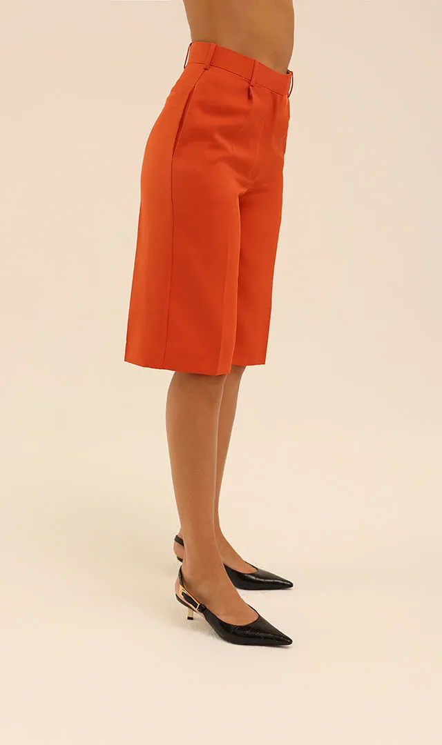 Mid Rise Bermuda Shorts in Red